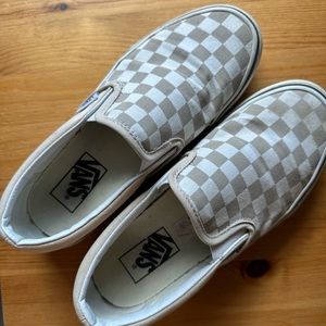 Checkered Tan Vans worn with care